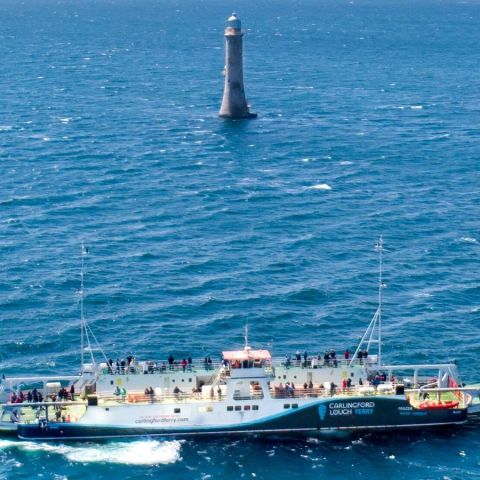 a small boat in a large body of water