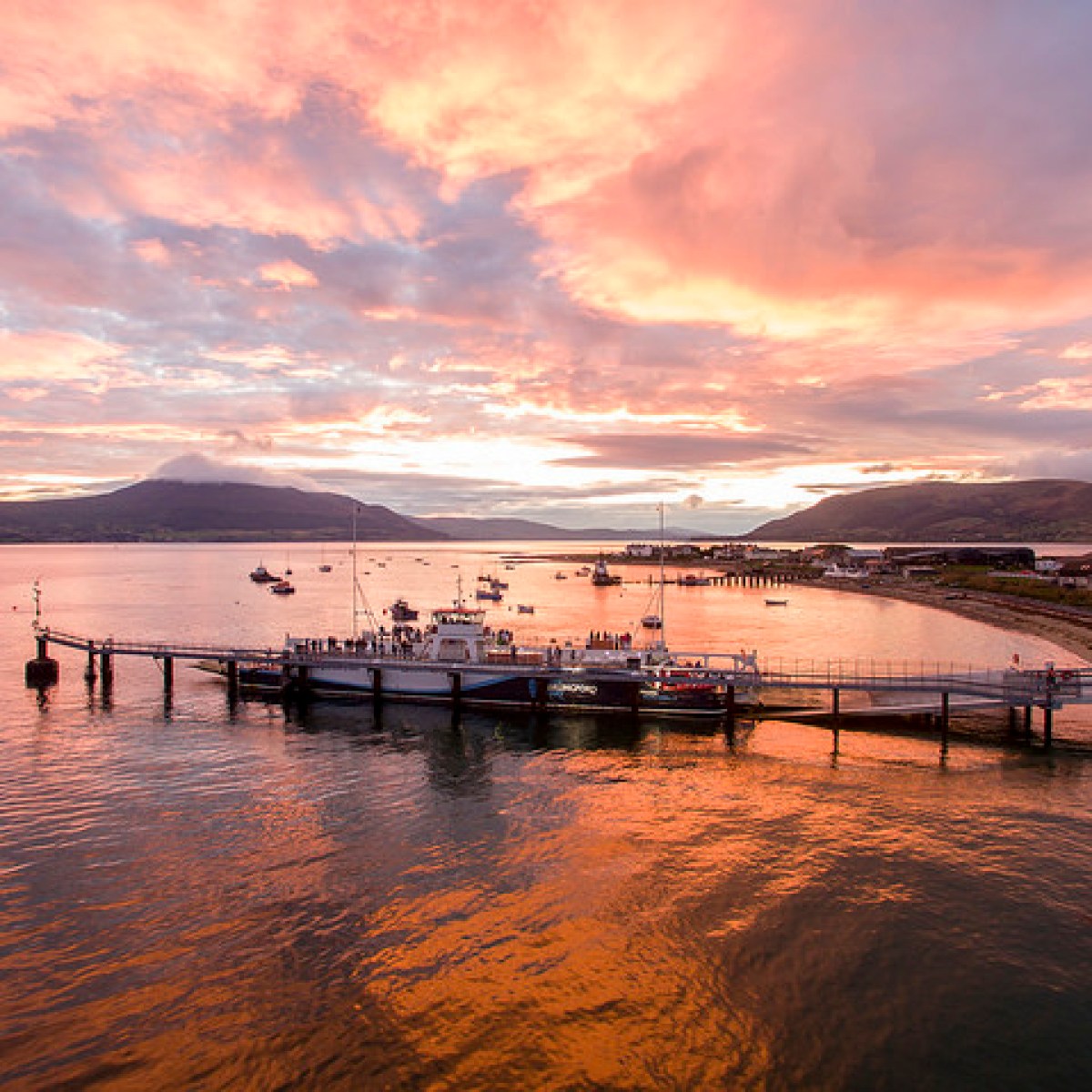 a sunset over a body of water