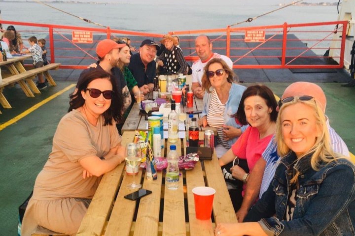 a group of people sitting at a table