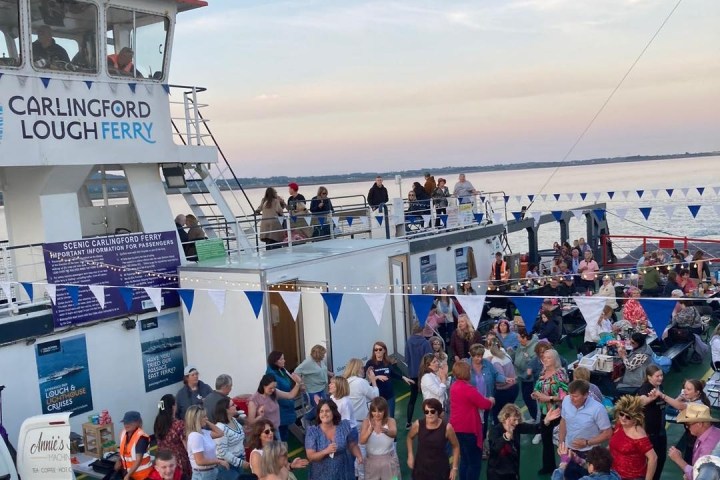 a group of people standing in front of a crowd